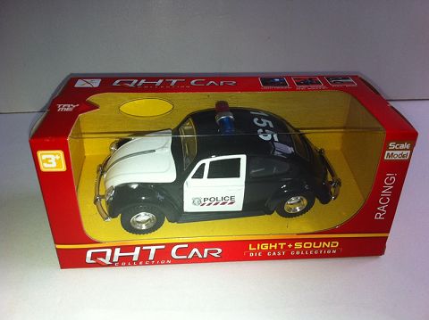 1:32 the alloy recovery old car police car opens the door three times, the front internal light with sound and light (a window box of one color mixed)